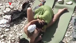 Beach Voyeur&period; Unashamed nudists having sex in excess of the beach right near others